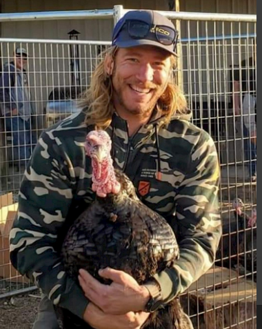 Nick Fahringer Overall Leader of the 2021 Turkey creek Enduro holds his Trophy